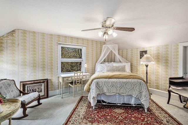 6073 Rocky Beach Ave, Charlevoix, MI 49720 - carpeted bedroom with wallpapered walls, baseboards, and ceiling fan
