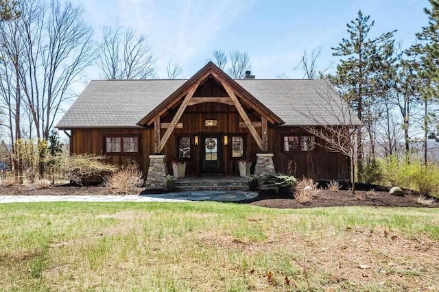 2149 Old Horton Bay Rd, Boyne City, MI 49712 - view of front of house with roof with shingles