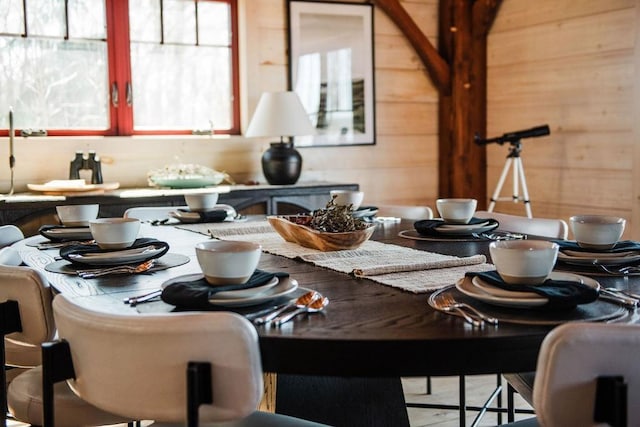 2149 Old Horton Bay Rd, Boyne City, MI 49712 - dining space featuring wood walls