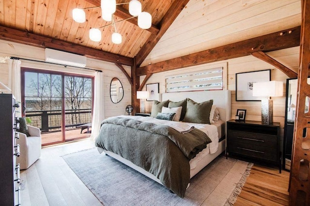 2149 Old Horton Bay Rd, Boyne City, MI 49712 - bedroom featuring a wall mounted AC, access to exterior, wood finished floors, wood ceiling, and wood walls