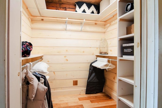 2149 Old Horton Bay Rd, Boyne City, MI 49712 - walk in closet featuring wood finished floors