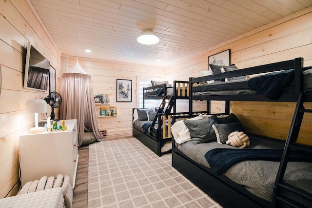 2149 Old Horton Bay Rd, Boyne City, MI 49712 - bedroom featuring wood ceiling, radiator heating unit, and wooden walls