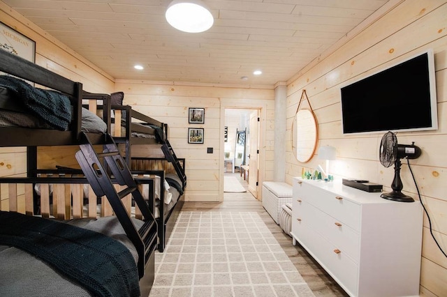 2149 Old Horton Bay Rd, Boyne City, MI 49712 - bedroom with light wood-style floors, wooden walls, wooden ceiling, and recessed lighting