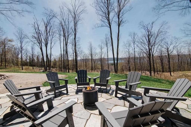 2149 Old Horton Bay Rd, Boyne City, MI 49712 - view of patio featuring a fire pit
