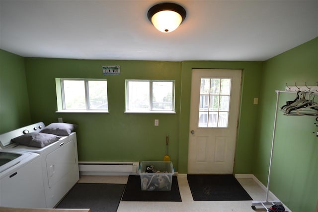 413 E Main St, Boyne City, MI 49712 - laundry room with separate washer and dryer, baseboard heating, plenty of natural light, and baseboards
