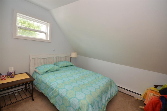 413 E Main St, Boyne City, MI 49712 - carpeted bedroom with a baseboard heating unit and lofted ceiling