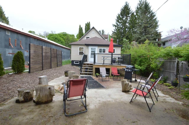 413 E Main St, Boyne City, MI 49712 - view of patio / terrace with a wooden deck, a grill, and stairs