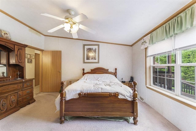 8370 Sisson, Bellaire, MI 49615 - carpeted bedroom featuring ornamental molding, a ceiling fan, and vaulted ceiling
