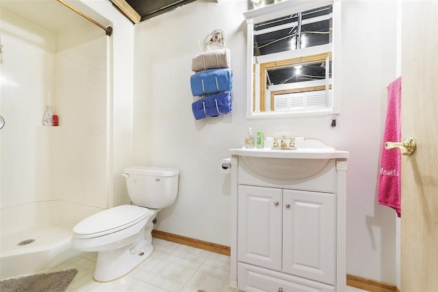 8370 Sisson, Bellaire, MI 49615 - full bath with baseboards, toilet, vanity, a shower, and tile patterned floors