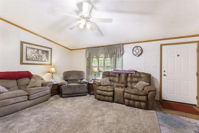 8370 Sisson, Bellaire, MI 49615 - carpeted living area featuring ornamental molding, vaulted ceiling, and ceiling fan