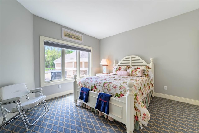 6040 Pine Lake Club Dr Unit 24, Charlevoix, MI 49720 - carpeted bedroom with baseboards