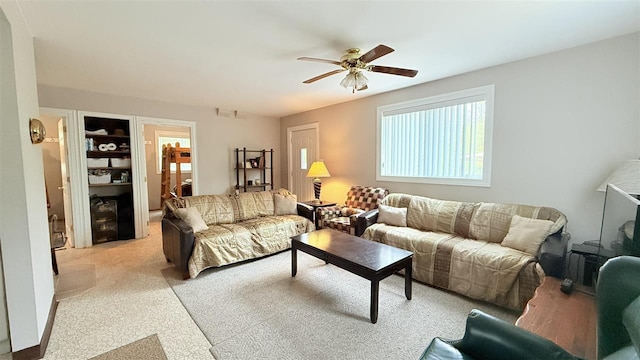 8902 Pickerel Lake Rd, Vanderbilt, MI 49795 - carpeted living room with a ceiling fan