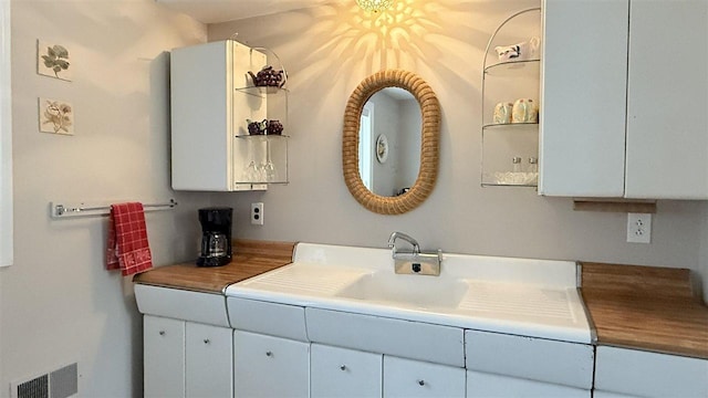 8902 Pickerel Lake Rd, Vanderbilt, MI 49795 - bathroom featuring vanity