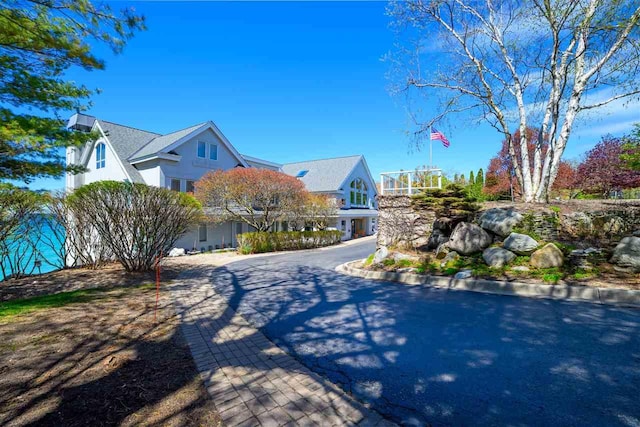 301 Michigan Ave Unit 13, Charlevoix, MI 49720 - view of asphalt street with curbs