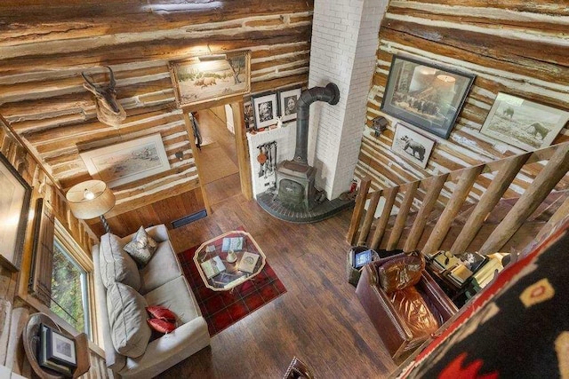 680 N Lake Shore Dr, Harbor Springs, MI 49740 - living room with a wood stove and wood finished floors