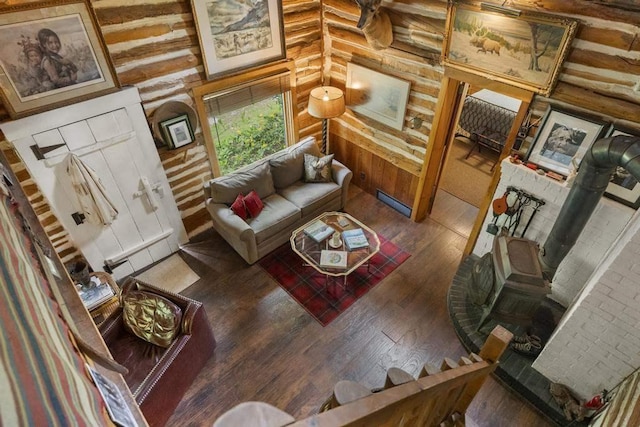 680 N Lake Shore Dr, Harbor Springs, MI 49740 - living area featuring hardwood / wood-style flooring and rustic walls