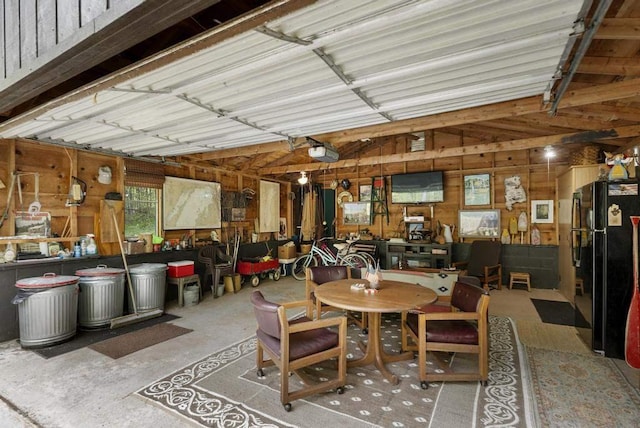 680 N Lake Shore Dr, Harbor Springs, MI 49740 - dining room with wood walls and vaulted ceiling