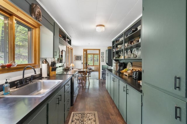 680 N Lake Shore Dr, Harbor Springs, MI 49740 - kitchen featuring electric stove, a sink, dark countertops, open shelves, and dark wood finished floors