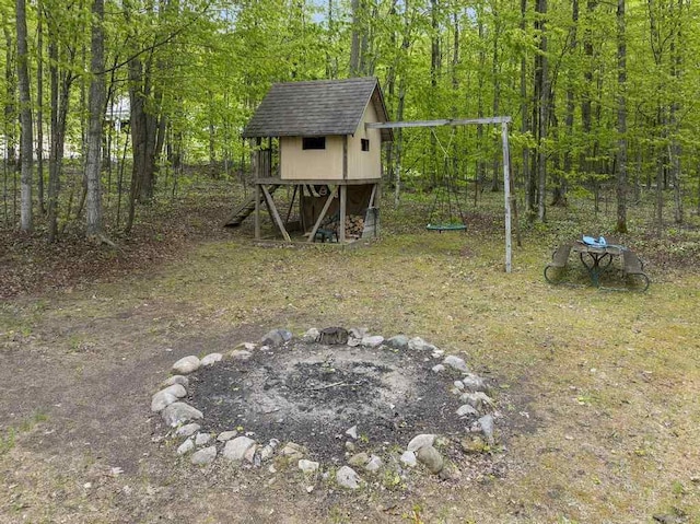 4545 Lintlong Rd, Petoskey, MI 49770 - view of yard featuring an outdoor structure and exterior structure
