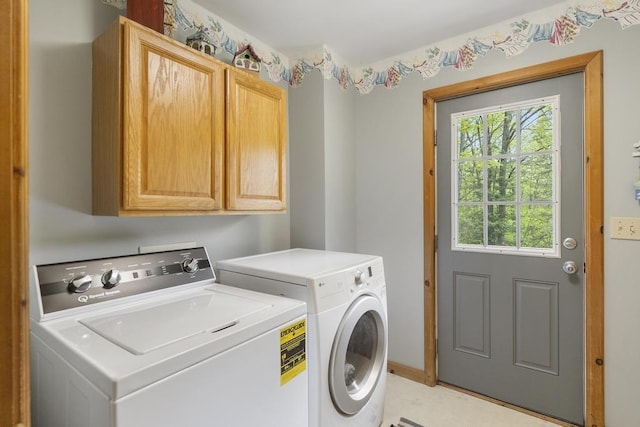 4545 Lintlong Rd, Petoskey, MI 49770 - laundry room with cabinet space and independent washer and dryer
