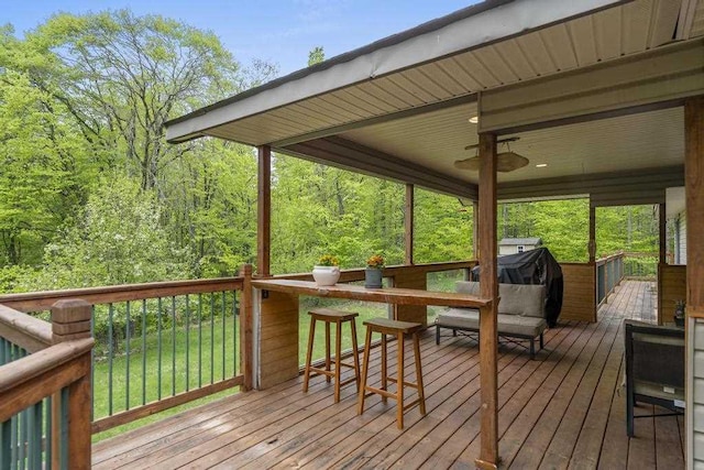 4545 Lintlong Rd, Petoskey, MI 49770 - deck featuring a view of trees