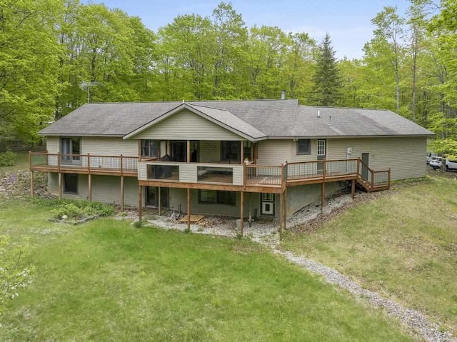 4545 Lintlong Rd, Petoskey, MI 49770 - back of house with a yard and a wooden deck