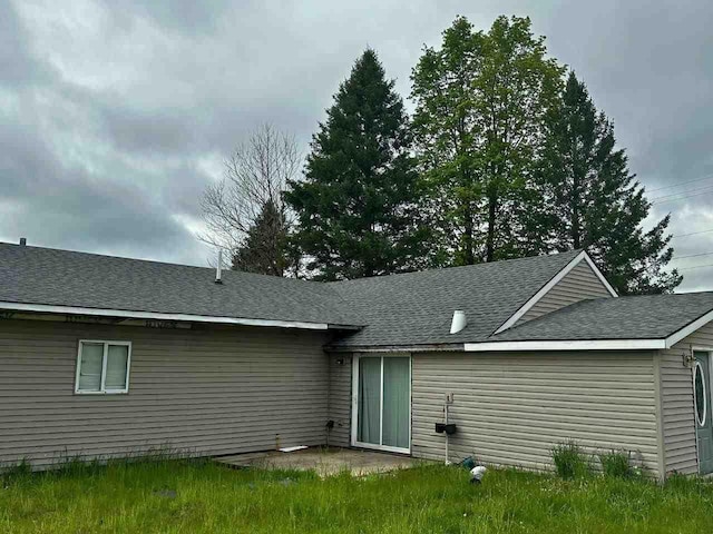 2378 E Old State Rd, East Jordan, MI 49727 - back of house with roof with shingles