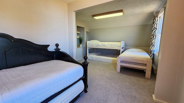 15718 N Blueberry Ln, Paradise, MI 49768 - carpeted bedroom featuring a textured ceiling