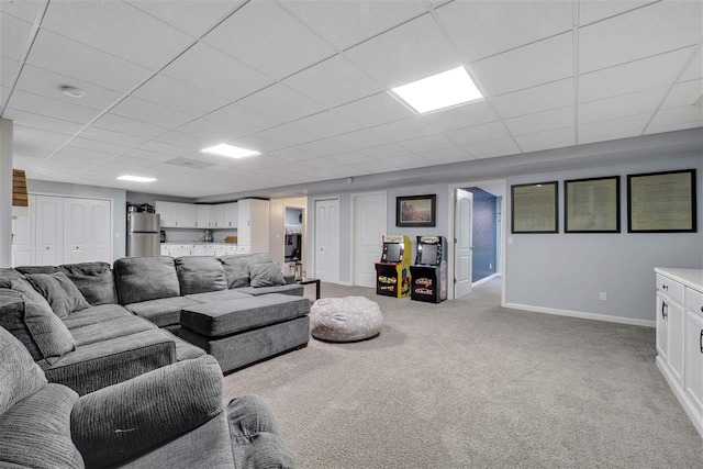 7101 Partridge Pl, Gaylord, MI 49735 - living room with baseboards, carpet, and a drop ceiling