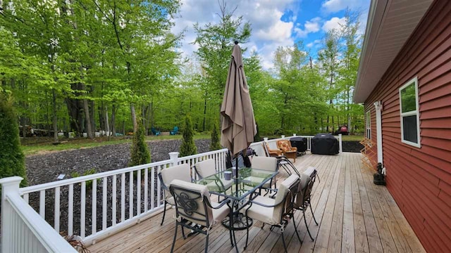 7101 Partridge Pl, Gaylord, MI 49735 - deck with outdoor dining space