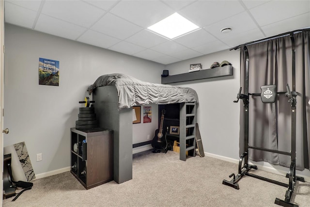 7101 Partridge Pl, Gaylord, MI 49735 - carpeted bedroom with a drop ceiling and baseboards