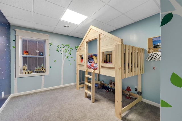7101 Partridge Pl, Gaylord, MI 49735 - bedroom featuring carpet floors, a paneled ceiling, and baseboards