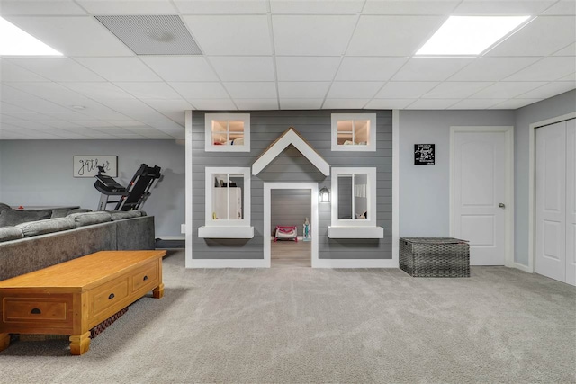 7101 Partridge Pl, Gaylord, MI 49735 - playroom with carpet flooring, a drop ceiling, and baseboards