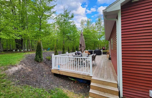 7101 Partridge Pl, Gaylord, MI 49735 - deck with outdoor dining area