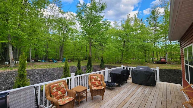 7101 Partridge Pl, Gaylord, MI 49735 - wooden deck with area for grilling
