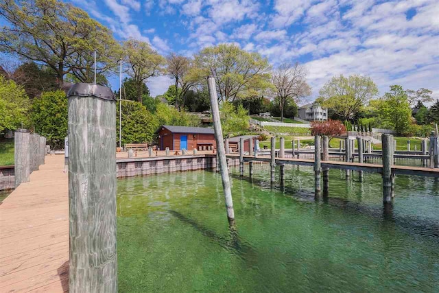 306 E Dixon Ave, Charlevoix, MI 49720 - dock featuring a water view