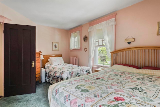 306 E Dixon Ave, Charlevoix, MI 49720 - carpeted bedroom featuring radiator heating unit