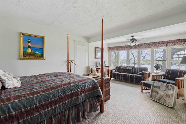306 E Dixon Ave, Charlevoix, MI 49720 - carpeted bedroom featuring a textured ceiling
