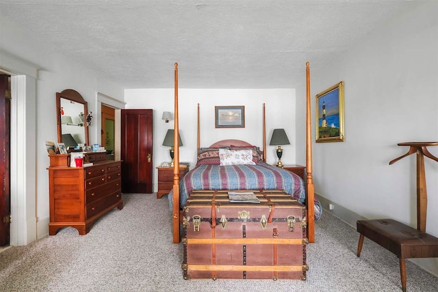 306 E Dixon Ave, Charlevoix, MI 49720 - bedroom featuring carpet and a textured ceiling