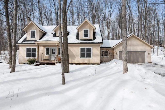 2508 Terpening Rd, Harbor Springs, MI 49740 - cape cod house with a garage