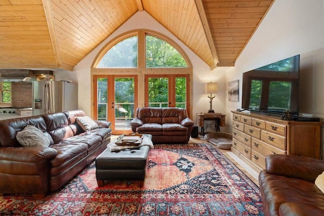 03675 Bc/Ej Rd, East Jordan, MI 49727 - living area featuring plenty of natural light, high vaulted ceiling, french doors, wood finished floors, and wood ceiling