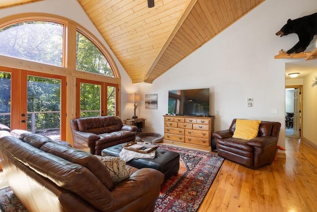 03675 Bc/Ej Rd, East Jordan, MI 49727 - living room featuring french doors, high vaulted ceiling, hardwood / wood-style floors, and wooden ceiling