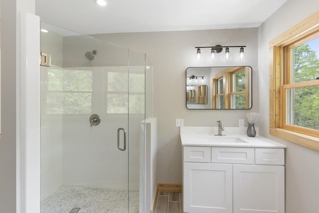 03675 Bc/Ej Rd, East Jordan, MI 49727 - full bathroom featuring a stall shower, vanity, and recessed lighting
