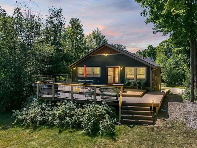 03675 Bc/Ej Rd, East Jordan, MI 49727 - rear view of property featuring a deck