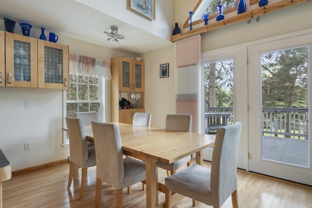 4460 E Fontenoy St, Boyne City, MI 49712 - dining space featuring light wood-style flooring