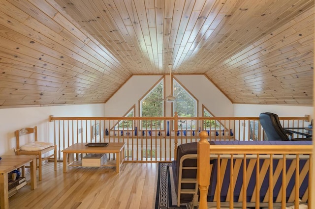 4460 E Fontenoy St, Boyne City, MI 49712 - sitting room with wood finished floors and vaulted ceiling