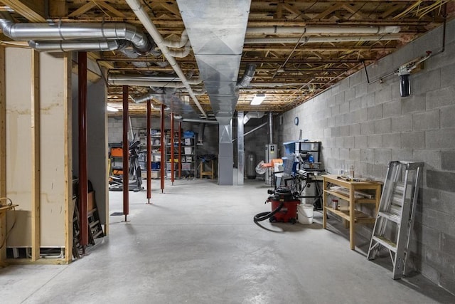 4460 E Fontenoy St, Boyne City, MI 49712 - unfinished below grade area featuring concrete block wall