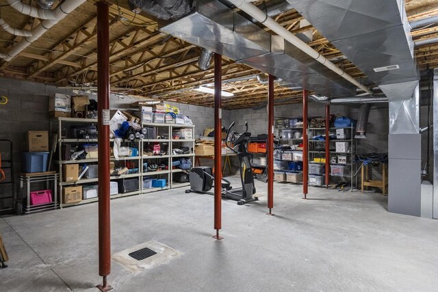 4460 E Fontenoy St, Boyne City, MI 49712 - unfinished below grade area featuring concrete block wall