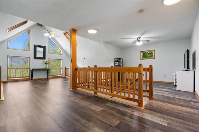 10370 Boyne City Rd, Charlevoix, MI 49720 - bonus room with ceiling fan, wood finished floors, baseboards, and lofted ceiling