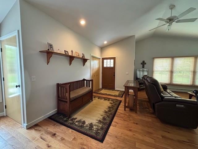 1020 Waukazoo, Petoskey, MI 49770 - foyer featuring lofted ceiling, light wood-style flooring, ceiling fan, and baseboards